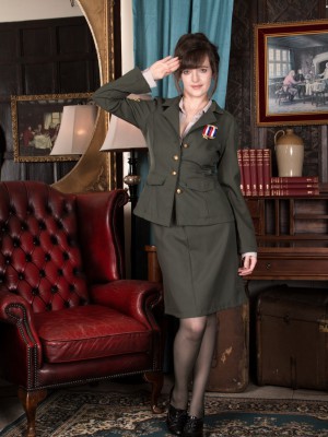 Kate Anne disrobes from her military uniform